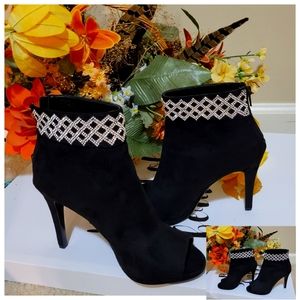 Black suede Caparros ankle booties with rhinestones, size 6.5.